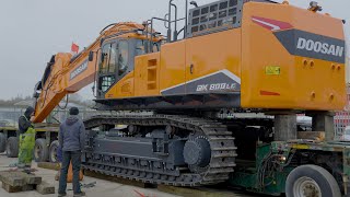 Moving New Doosan DX800 Excavator From Dealers Yard [upl. by Sosna638]