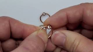 How to remove a ballbead from a Captive Bead Ring CBR No Tools Body Jewelry [upl. by Plusch]